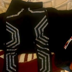 Women sequined pants.  Star studded black.  Awesome for a dress up occasion.